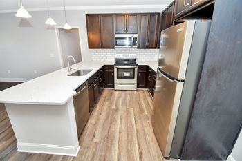 Modern kitchen with white subway tile backsplash
