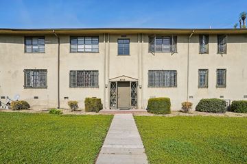 Los Angeles apartment for rent - A building with a walkway in front of it.