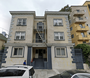 Los Angeles apartment for rent - A two-story building with a car parked in front.