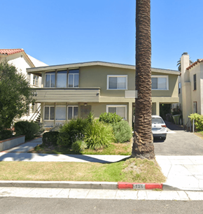 Beverly Hills apartment for rent - A house with a palm tree in front of it.