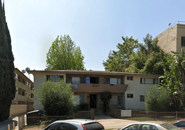Los Angeles apartment for rent - A building with the number 837 on it is surrounded by trees and has cars parked in front.