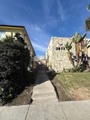 Los Angeles apartment for rent - A stone building with the number 3871 on it.