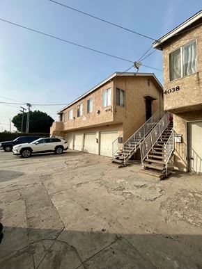Los Angeles apartment for rent - A car is parked in front of a house with the number 4038 on it.