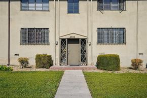 Los Angeles apartment for rent - A building with a number 4055 on the top of the door.