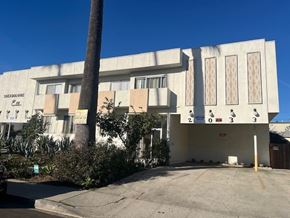 Los Angeles apartment for rent - A building with a sign that says "SHERBURNEY CITY" on it.