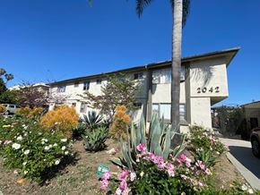 Los Angeles apartment for rent - A white building with the number 2042 on it.
