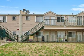 Los Angeles apartment for rent - Apartment complex with a green lawn in front.