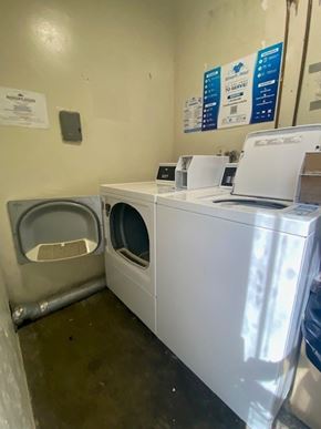 Los Angeles apartment for rent - A row of washing machines in a laundromat.