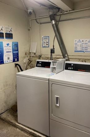 Los Angeles apartment for rent - A washing machine with a digital display on top.