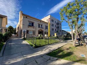 Los Angeles apartment for rent - A building with a yellow flag on the front.