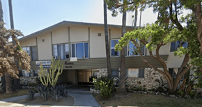 Los Angeles apartment for rent - A building with a sign that says "Aloha" on it.