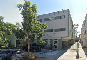 Los Angeles apartment for rent - A modern building with a tree in front of it.