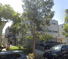 Los Angeles apartment for rent - A black truck is parked in front of a house.