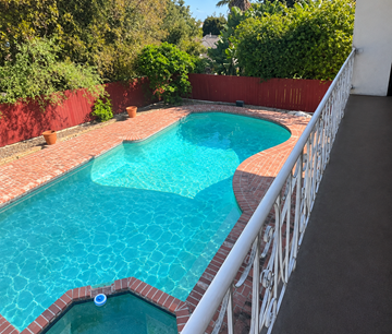 Los Angeles apartment for rent - A small pool with a white fence around it.