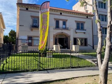 Los Angeles apartment for rent - A building with a "Now Renovate" banner in front of it.