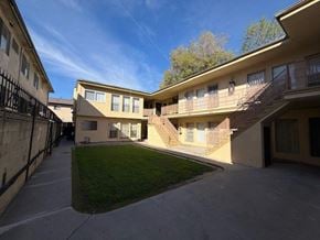 Los Angeles apartment for rent - A sunny day at a residential complex with a clear blue sky.