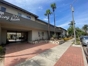 Los Angeles apartment for rent - King Ham Plaza is a building with a sign on it.
