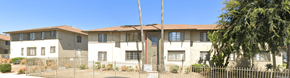 Los Angeles apartment for rent - A row of houses with a sign in front.