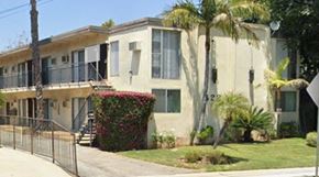 Los Angeles apartment for rent - A row of houses with a fence in front.