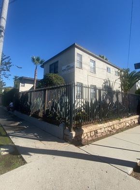 Los Angeles apartment for rent - A house with a fence and a sign that says "NO PARKING".
