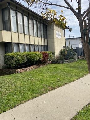 Los Angeles apartment for rent - A building with a sign that says "Pinehurst".