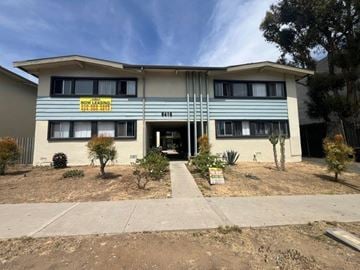 Los Angeles apartment for rent - A two-story building with a "Now Leasing" sign on the front.