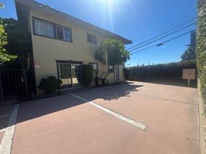 Los Angeles apartment for rent - A sunny day at a residential area with a house and a driveway.