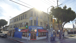 Los Angeles apartment for rent - A street view of a building with a sign that says "Pulser".
