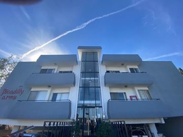 Los Angeles apartment for rent - A modern building with the words "Piccadilly Arms" on the side.