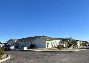Fort Mohave apartment for rent - A house with a car parked in front.