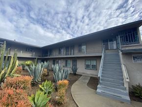 Compton apartment for rent - A building with a grey staircase in front of it.