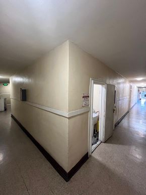 Los Angeles apartment for rent - A long hallway with a door at the end.
