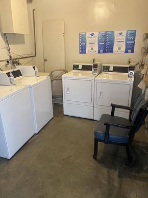 Los Angeles apartment for rent - A room with a chair and some machines.