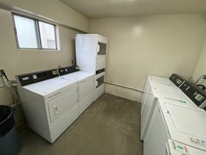 Mission Hills apartment for rent - A laundry room with a washer and dryer.