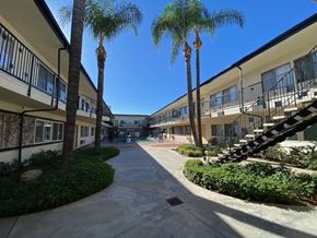 Mission Hills apartment for rent - A sunny day at the apartment complex with a clear blue sky.