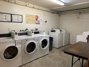 North Hollywood apartment for rent - A laundromat with washers and dryers is clean and ready to use.