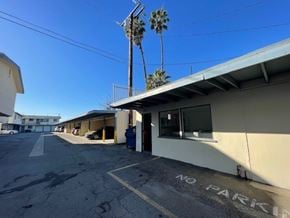 Compton apartment for rent - A parking lot with a sign that says "NO PARKING".