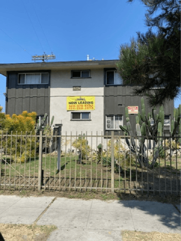 Los Angeles apartment for rent - A house with a sign that says "Now Leasing" on the front.