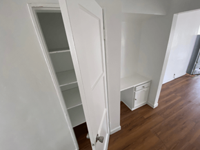 Los Angeles apartment for rent - A white door is open to a room with a white cabinet and drawers.