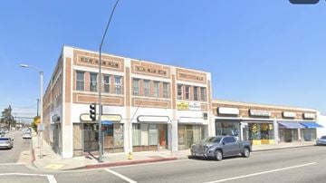 Bell apartment for rent - A street view of a building with the sign "Teen Film Night" on the top floor.