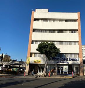 Los Angeles apartment for rent - A building with a dental office on the ground floor.