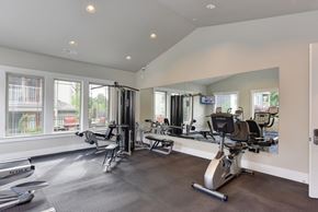 Renton apartment for rent - Fitness Center with Excercise Bike, Chest Machines, Full Mirrors, Rubber Matt Floor