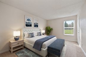 Napa apartment for rent - the preserve at ballantyne commons bedroom with bed and window at Vineyard Terrace Apartments, California