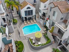 Burbank apartment for rent - Ariel shot of the center of the apartment community with the swimming pool area surrounded by the apartment buildings. 