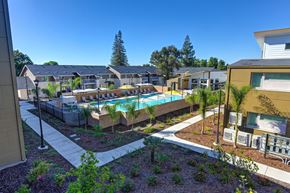 Folsom apartment for rent - A Pool Surrounded by a Fence at Canyon Terrace Apartments, Folsom, CA
