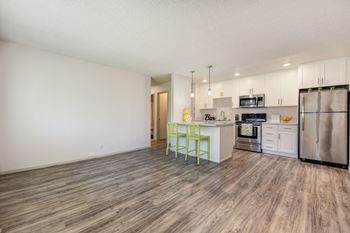 2X1 floor plan with harwood inspired flooring through out the living room and kitchen areas.