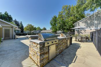 Pinecrest bbq area with 2 built-in gas bbq's by the pool area.