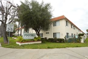 Vista apartment for rent - A sign in front of a house that says "FOOTHILL COUNTRY".