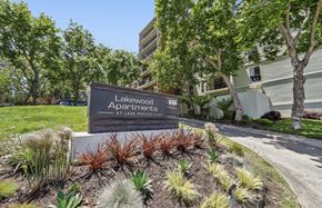San Francisco apartment for rent - A sign for Lakewood Apartments at Lake Merced is in front of a building.