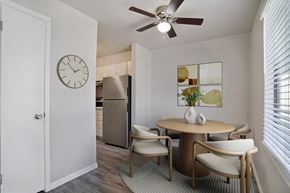 West Valley City apartment for rent - A dining room with a table and chairs.
